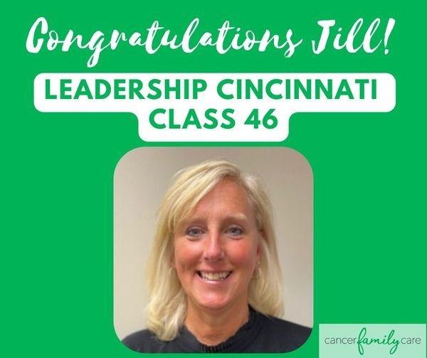 Jill Settlemyre headshot in green frame