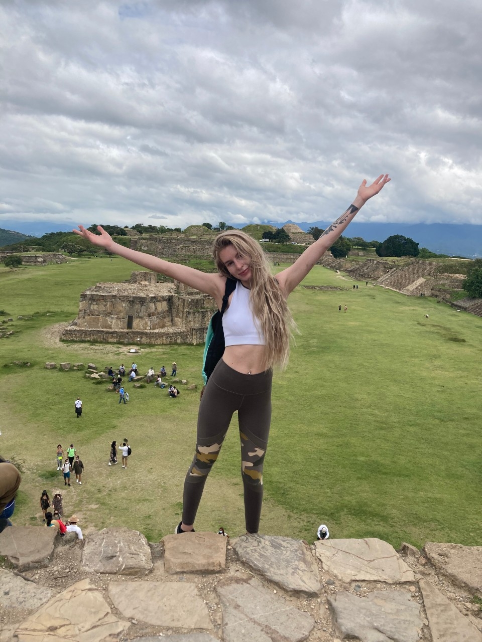 Cayla Cowens standing at ruins