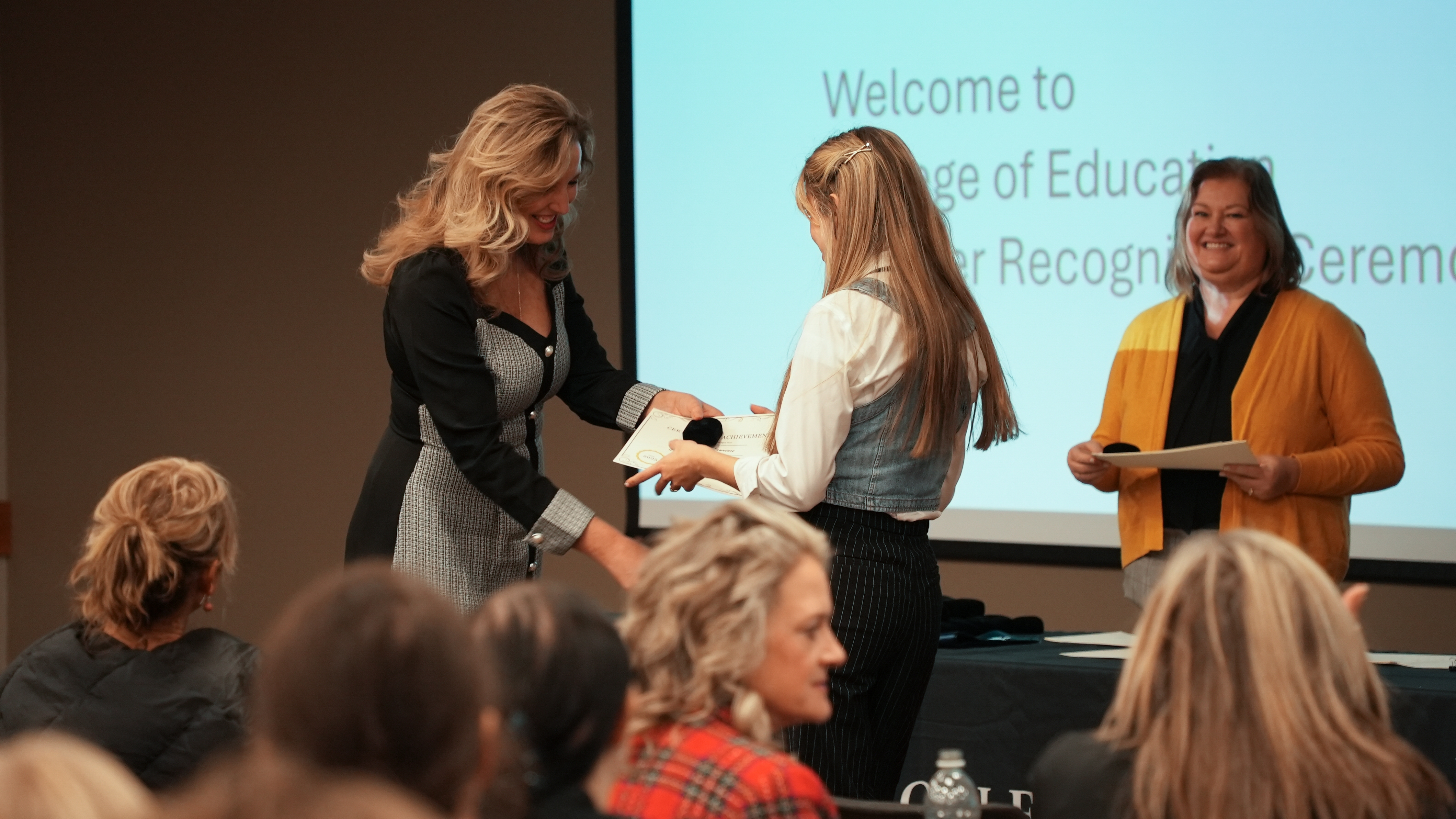 Student Receives Certificate